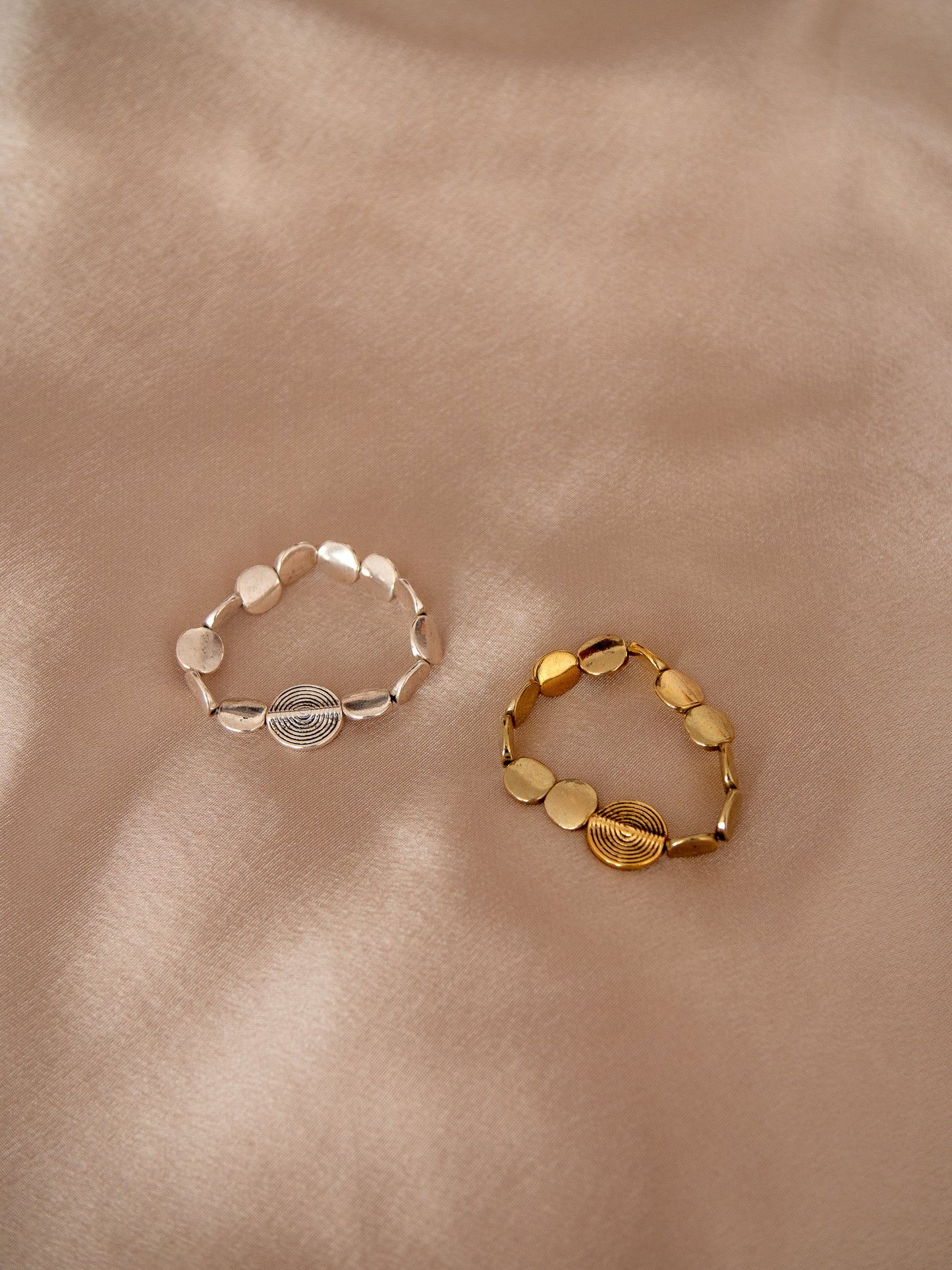 silver & gold spiral wave bracelets
