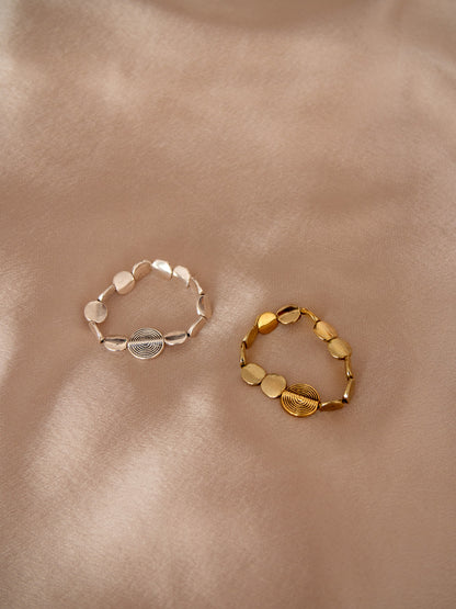 silver & gold spiral wave bracelets