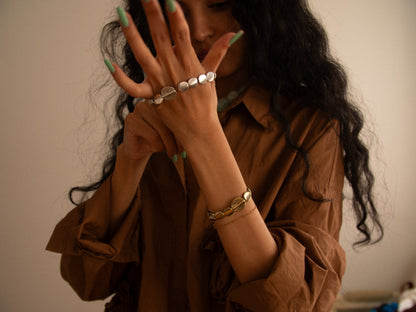 silver & gold spiral wave bracelets